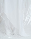 Camicia lunga asimmetrica in organza e lana